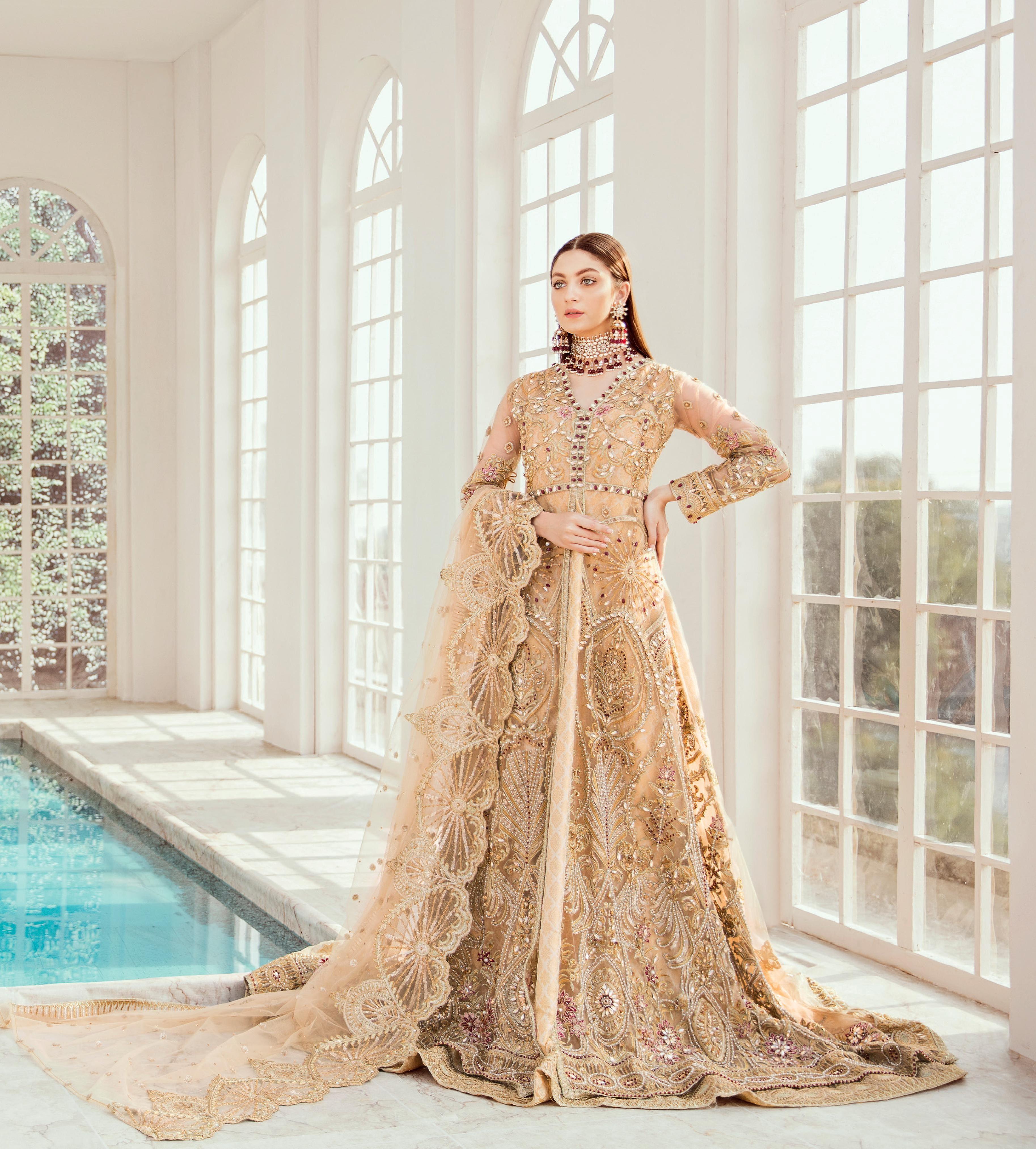 green emerald velvet dress GOLD INDIAN DESIGNER WEDDING AND BRIDAL GOWN main image 1